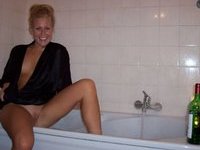 Blonde babe taking a bath