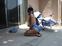 Sunbathing topless and teasing