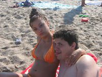 Nibbling nipples on the beach