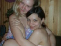 Sweet lesbians stripping and smiling