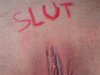 Slut written on her body