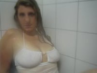 Wet blonde with large breasts