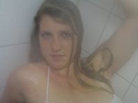 Wet blonde with large breasts