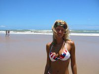 Many topless shots of my blonde wife at beach