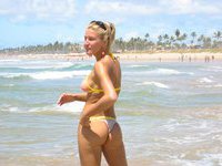 Many topless shots of my blonde wife at beach