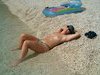 My GF sunbathing topless