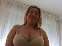 Busty mature wife showing her boobs