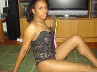 Cute ebony posing nude and sucking dick