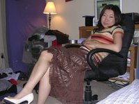 Asian GF posing and sucking dick
