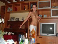 Russian amateur wife posing naked at home
