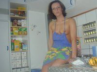 Sexy amateur wife at kitchen