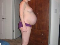 Pregnant amateur wife nude at home