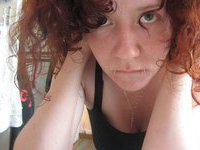 Redhead amateur wife posing at home