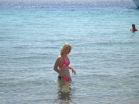Blonde GF topless at beach