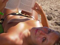 Sexy amateur blonde sunbathing