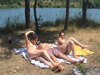 Real nudists sunbathing naked