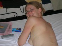 Nerdy amateur slut posing nude