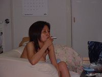 Asian amateur teen posing nude on cam