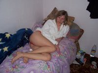 Amateur girl posing topless at home