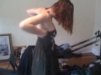 Redhead amateur GF posing naked in her room