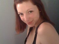 Redhead amateur GF posing naked in her room