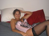 Young wife posing in hot lingerie