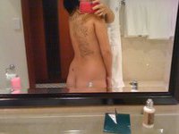 Young amateur wife making hot selfshots