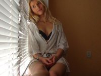 Sexy amateur blonde posing on cam
