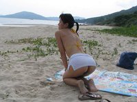 Asian amateur wife posing nude outdoors