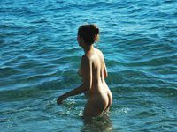 Tree amateur girl topless at beach