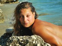 Tree amateur girl topless at beach