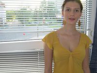 Young amateur blonde showing her tits