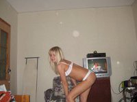 Amateur blonde posing nude at home