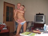 Amateur blonde posing nude at home