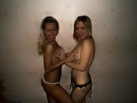 Two amateur blondes posing topless