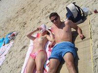 Amateur brunette topless at beach