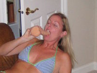 Mature mom playing with dildo