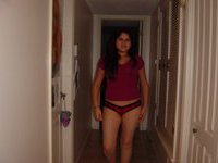 Young amateur latina posing topless