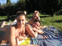 Four amateur girls topless outdoors