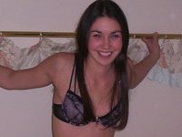 Beautiful amateur girl posing nude on bed
