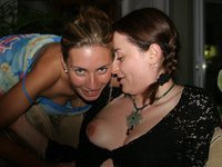 Between two sexy MILFs