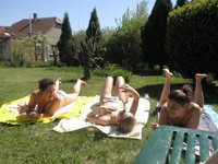 Four amateur girls topless outdoors