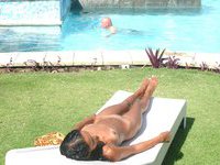 Ebony amateur girl sunbathing nude