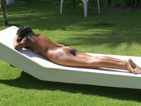 Ebony amateur girl sunbathing nude