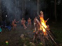 naked girls near fire