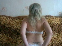 russian blonde posing on couch