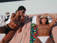 Girls sunbathing topless