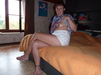 Amateur mom with her black dildo
