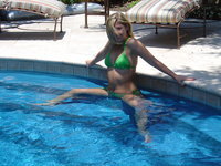 blonde teen gets naked near pool