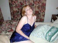 Redhead wife shows her body
